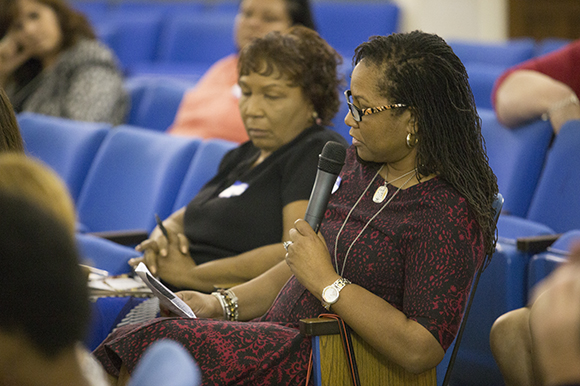 Colette Glover-Hannah asks a question from the audience at the Not Your Average Speakers event.