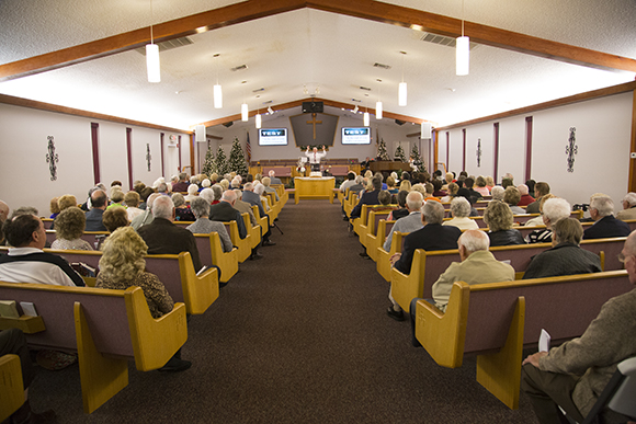 Pastor Tom Durrance leads Sunday service at Church of God in Wimauma.