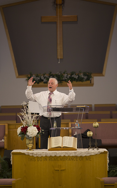 Pastor Tom Durrance leads Sunday service at Church of God in Wimauma.