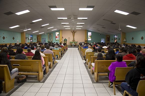 Father Gilberto Quintero leads Sunday Mass at Our Lady of Guadalupe in Wimauma. 