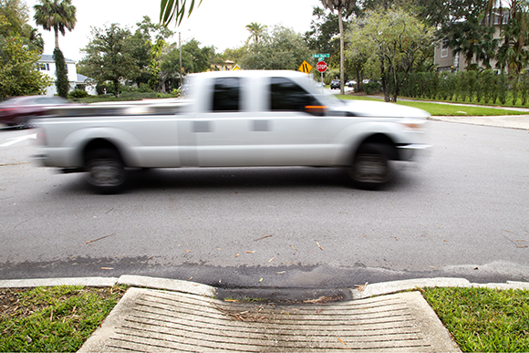 West Neptune at West Shore Blvd. has an inset sidewalk creating a blind spot for cars. 