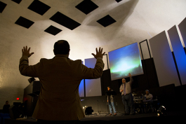Pastor Carlos Irizarry leads Sunday service at Wholesome Community Ministries in Wimauma. 