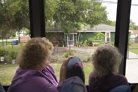 Bus tour particpants get a look at a Habitat for Humanity house built in Wimauma.