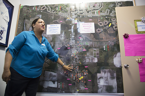 Liz Gutierrez, Founder and CEO at Enterprising Latinas, shows a map of Wimauma including new development. 