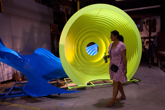 Saba Attari walks past Mark Aeling's sculpture entitled 'Splash'.