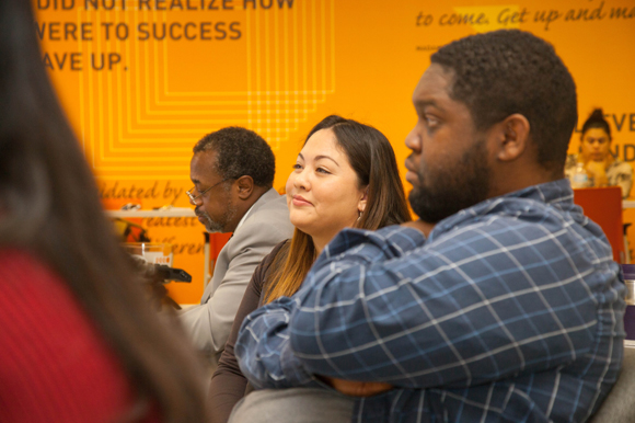 (L-R) Erik Gates, Amanda Almorado, and Andy Hardy listen to ideas presented by entrepreneurs.