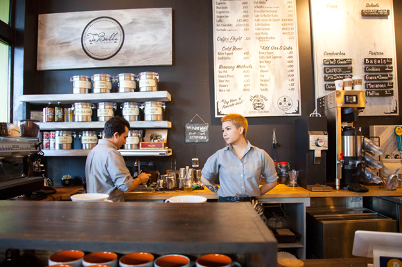 Esteban Cristancho, left, and Izzy Honda serve up hot drinks at Blind Tiger.