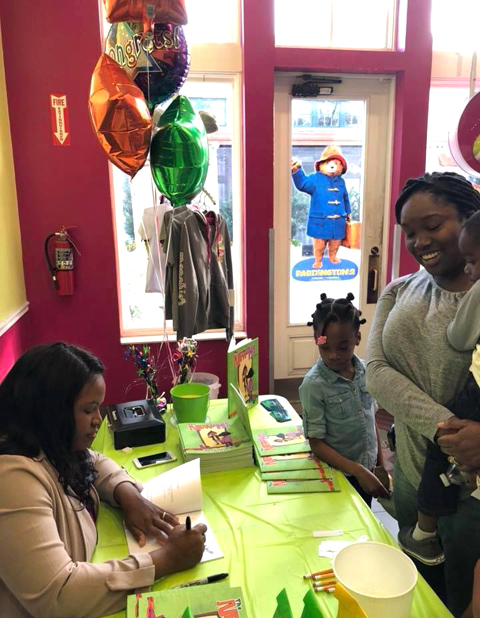 Latoya Desamour at her book launch signing for "The New Me".