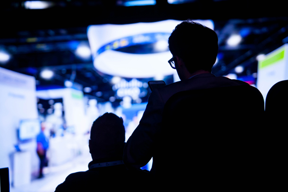 Guests listen to speakers at Innovation Summit 2018 at Amalie Arena.