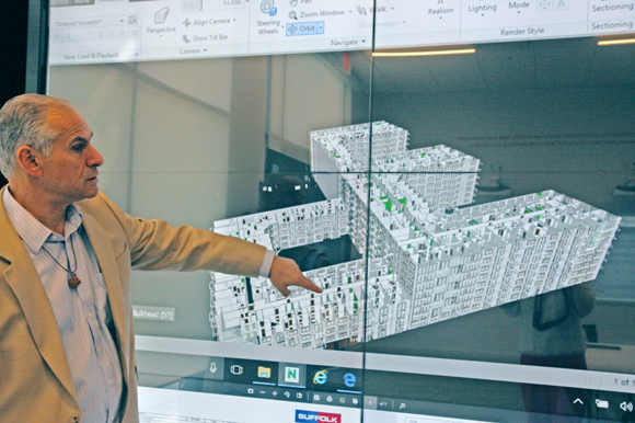 Julius Nasso shows Manor Riverwalk plans in the Smart Lab.
