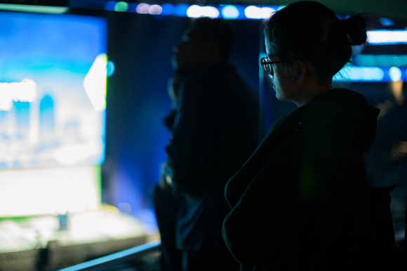 Viewers listen in as Lakshmi Shenoy, CEO of Tampa Innovation Hub, speaks at the Synapse Innovation Summit.