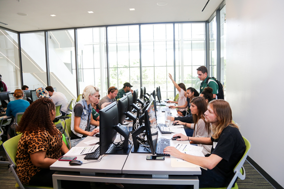 Students inside the Merrill Lynch Wealth Management Center at USFSP.