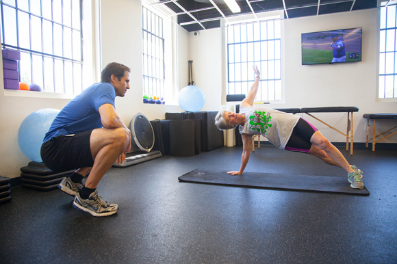 Jason Johnson, a personal trainer, works with Patty Woods at the Bryan Glazer Family JCC in West Tampa.