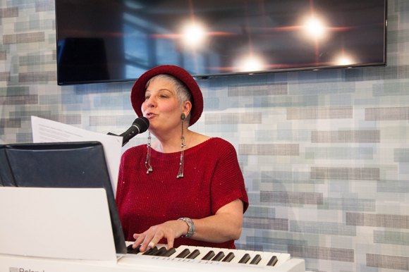 Joy Katzen-Guthrie performs during Culture Café at lunch inside JCC.