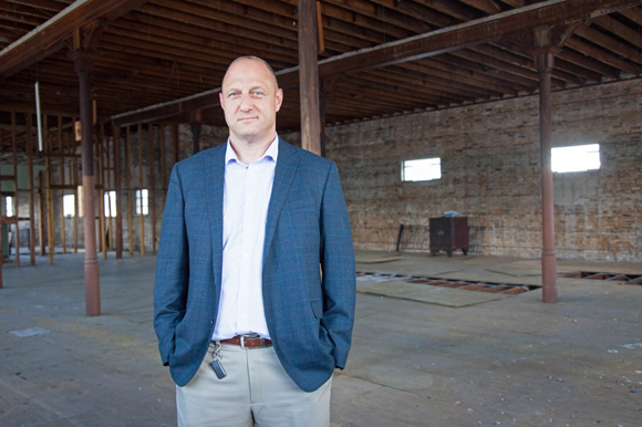 Mike Braccia, co-owner of Main Street Property Holders, at his property in West Tampa.