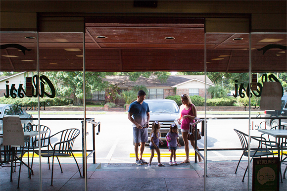 Jorge and Maria Castillo and their two children enter Alessi Bakery, a historic eatery in West Tampa celebrating 105 years.