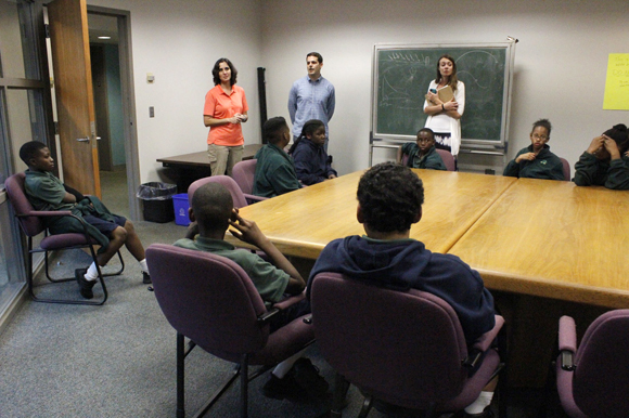 (L-R) Kelly Quinn, Bernardo Motta, Laura Manke, and Academy Prep students prepare to visit the USF College of Marine Sciences lab.