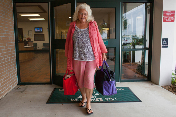 Daina Shukis leaves a Lecanto hurricane shelter after evacuating during Hurricane Matthew in 2016.