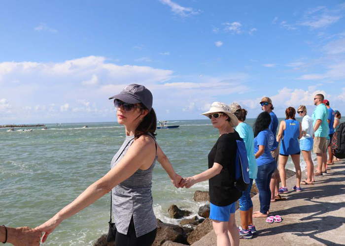 Hands Across the Sand in John's Pass, an area vulnerable to impacts from climate change (2018)..