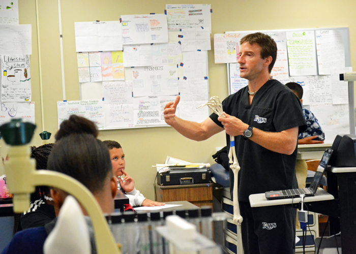 A teacher at Sligh Middle Magnet School leads a lesson on anatomy.