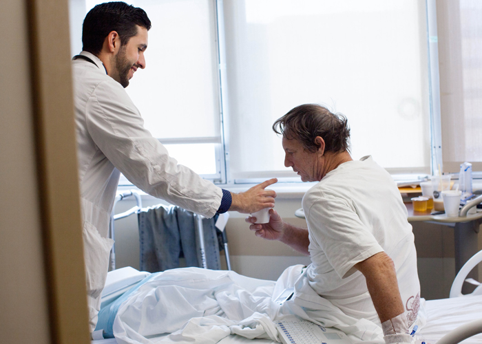 David Pimms receives care from Jesus Vera Diaz, a student doctor, who helped provide care for Pimms infection in his heart.