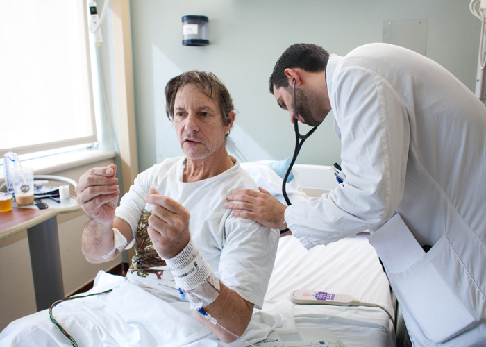 Jesus Diaz Vera, a student doctor with the USF Morani College of medicine, works at his infectious disease rotation at Tampa General Hospital.