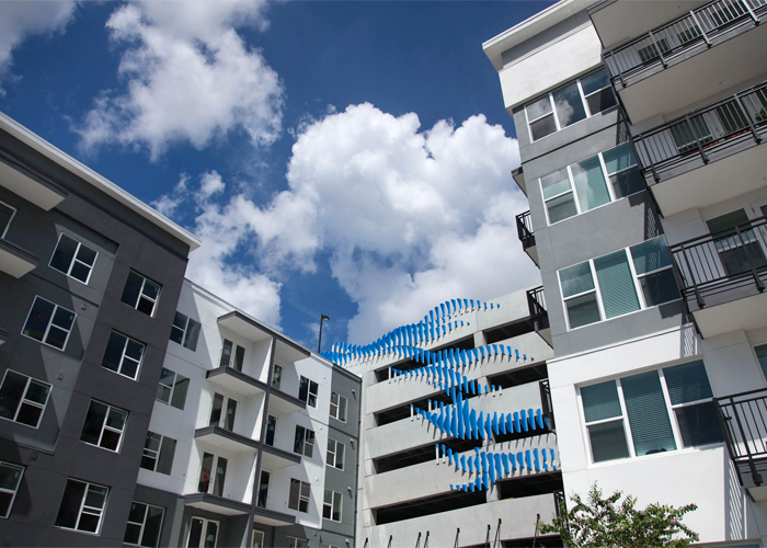 Wrap design parking structure at Novel Riverwalk.