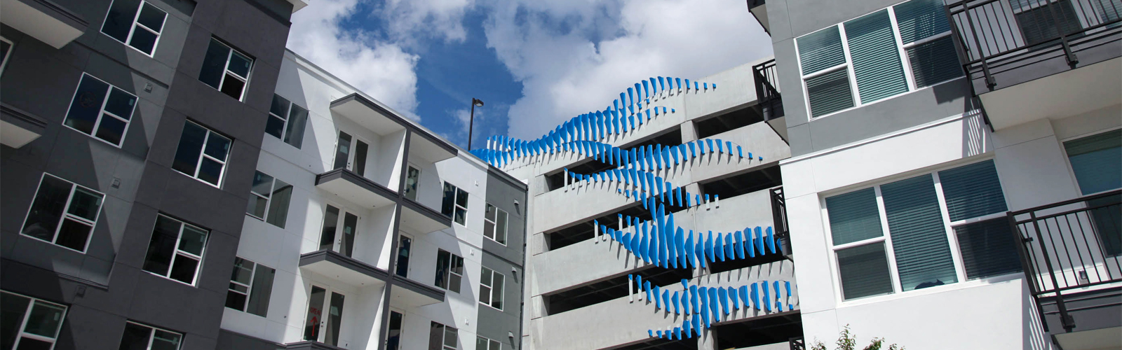 Wrap design parking structure at Novel Riverwalk.