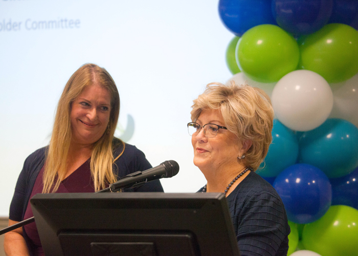 Susan Glickman, Fla., Dir., of the Southern Alliance for Clean Energy, and Janet Long, Pinellas County Commissioner at the signing to form the TBRRC along with 24 local governments.