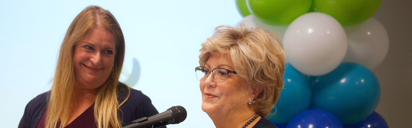 Susan Glickman, Fla., Dir., of the Southern Alliance for Clean Energy, and Janet Long, Pinellas County Commissioner at the signing to form the Tampa Bay Regional Resiliency Coalition.