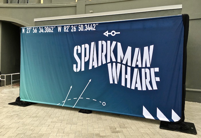 Signage announcing opening of Sparkman Wharf.