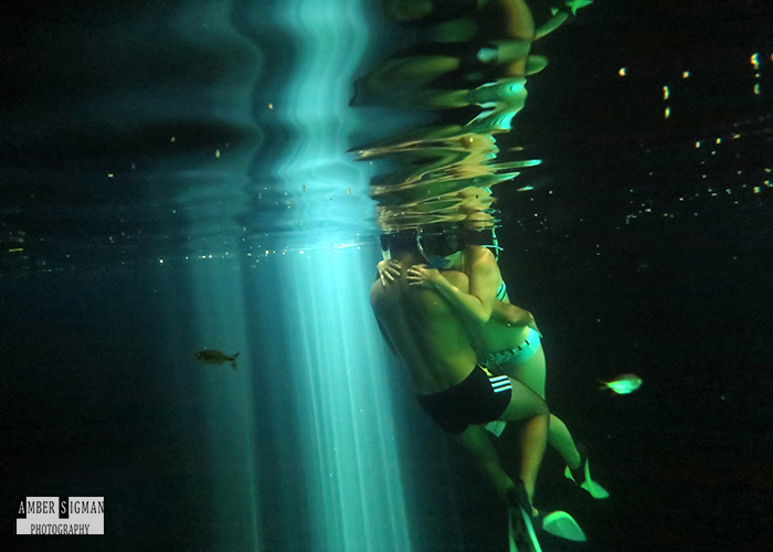 Lovers embrace at a cenote in Macario Gomez, Mexico.