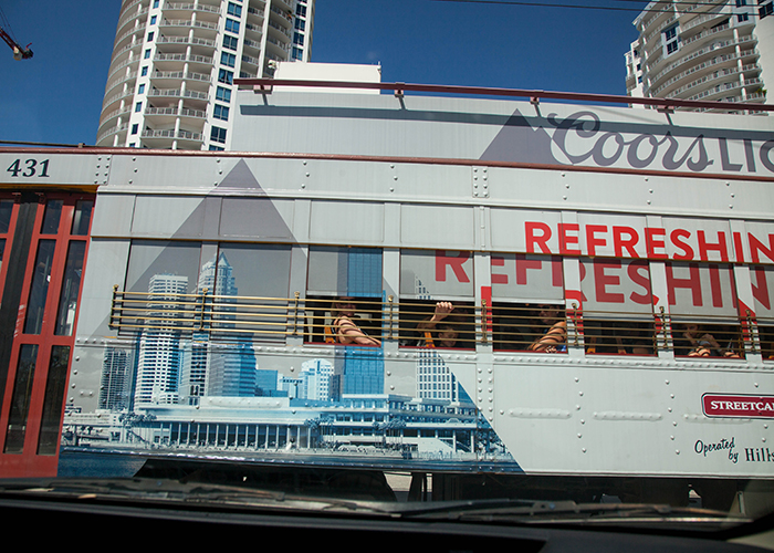 A trolley passes through the Channelside district.