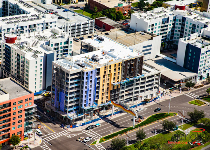 A Hampton Inn, Home 2 Suites by Hilton, and a Starbuck undergo construction in the Channel District.