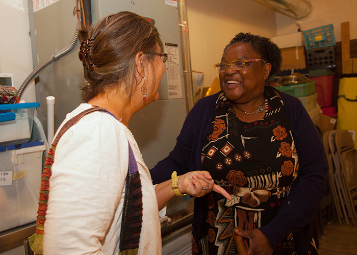 Marti Zeitz, left, mingles with Mozella Callaway who brings art classes to the Pinellas County Jail to teach women how to sew, make jewelry, and other crafts with the Red Tent Women's Initiative.