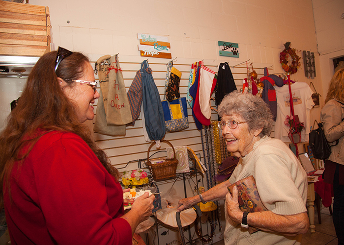 Beth Connor, and her mother Kathryn Connor, age 89, at the Red Tent's holiday open house party.