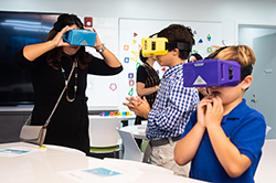 Students experiment with virtual reality goggles.