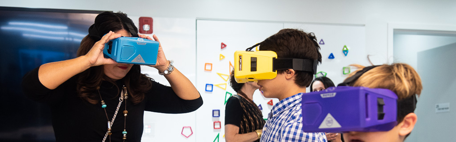 Students experiment with virtual reality goggles.