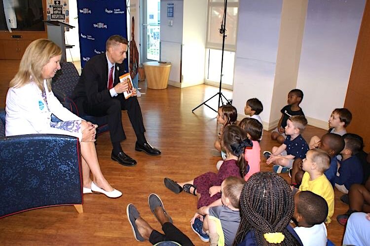 Hillsborough County Schools Supt. Jeff Eakins reads "Brown Bear, Brown Bear, What Do You See?'' to toddlers at St. Joseph’s Children’s Hospital's daycare to demonstrate how to engage kids in reading.