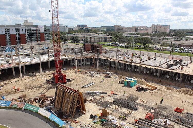 Cranes are helping build a new six-story bed tower at AdventHealth Hospital at the northeast corner of Fletcher Avenue and Bruce B. Downs Boulevard near the University of South Florida.