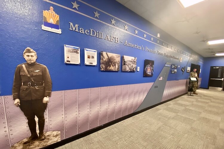 Inside a briefing room at MacDill Air Force Base, guests learn about the history and economic impact of the base.