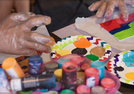 Kids fingerpainting at Glazer Children's Museum in Tampa.