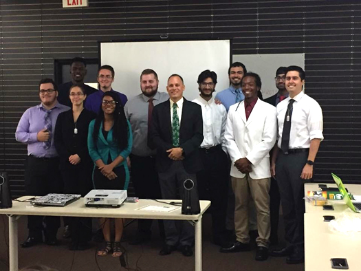 Instructor Clinton Daniel, center front, with TechHire students and assistants.