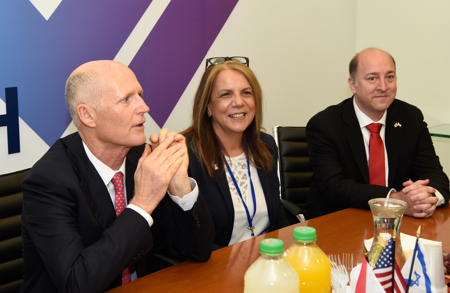 From left, Gov. Rick Scott, Dr. Vicki Rabenou and A.J. Ripin