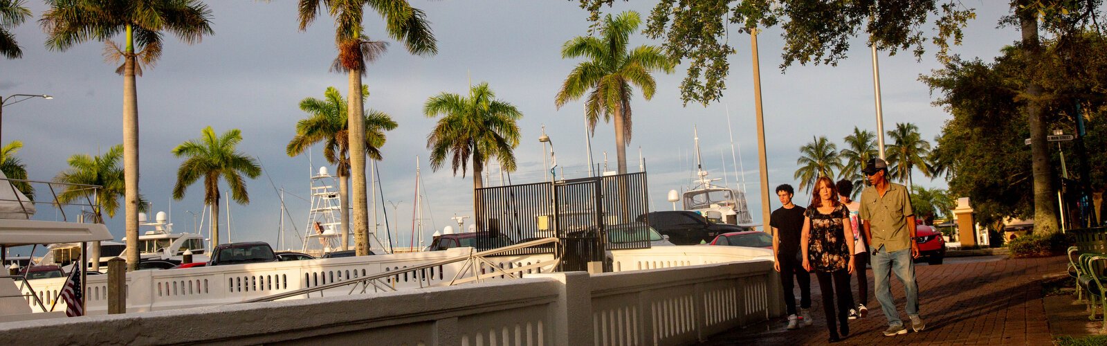 Locals check out the sunset along the riverwalk in downtown Bradenton over the weekend.