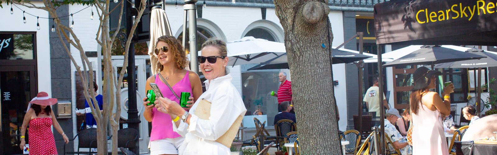 Guests gather for collections of wine, beer and spirit samples from restaurant vendors at the monthly Saturday evening Sip and Stroll event in downtown Clearwater.