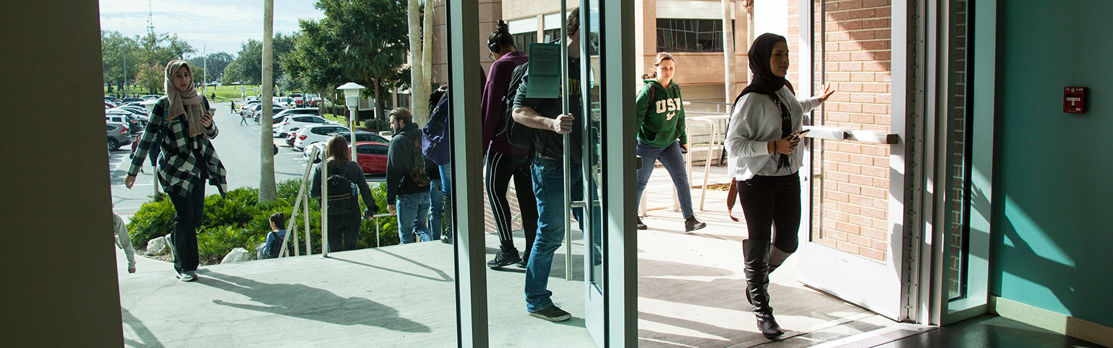 Students head to classes in the USF Interdisciplinary Sciences building.