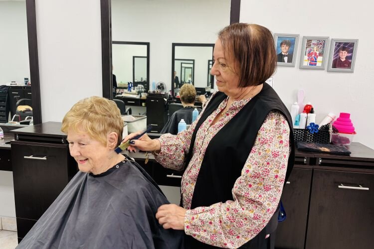 Carmen Conrad with Candy Brandt, a customer for six years who has also brought her mother to Carmen's salon.