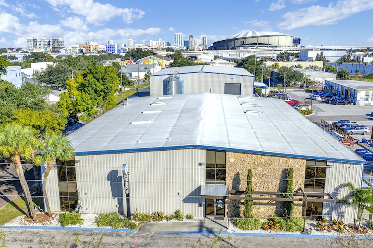 Tropicana Field on St. Pete's skyline as seen from 3 Daughters Brewing.