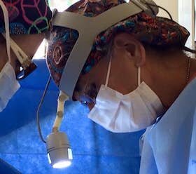 Dr. Sylvia Campbell at work on a medical mission trip to Haiti.
